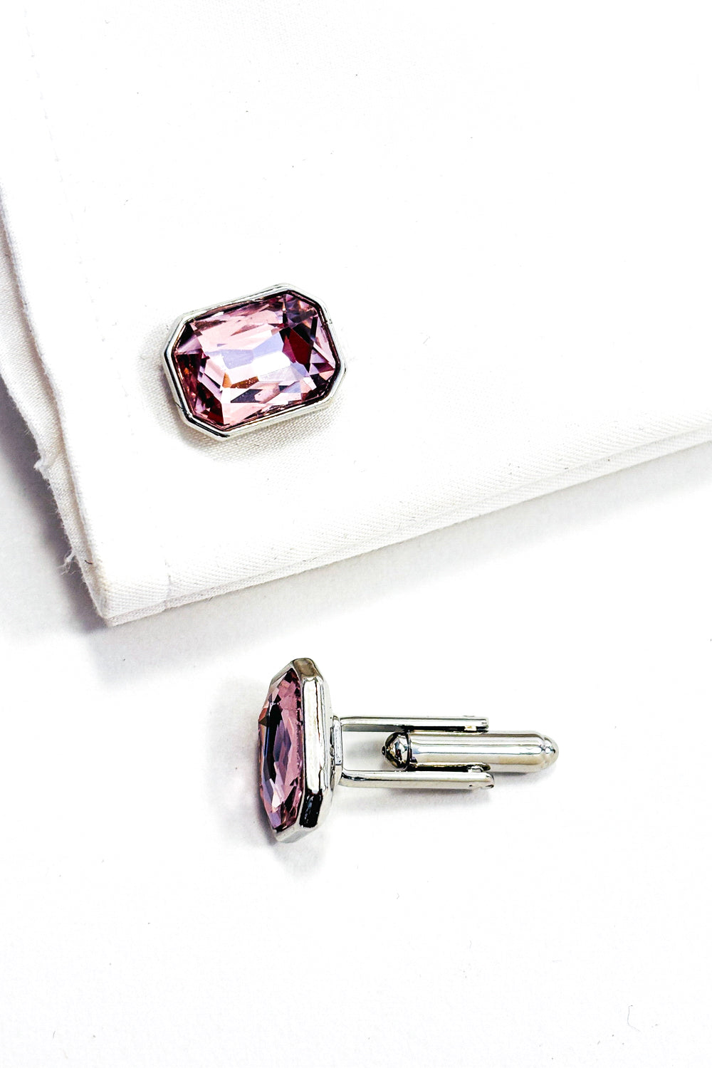 Light pink emerald cut crystal silver cufflinks.