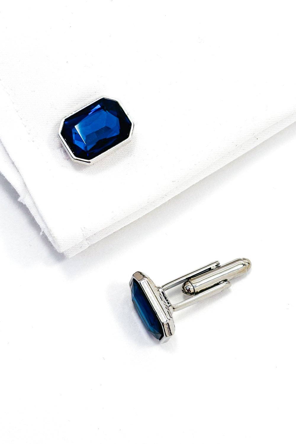Kashmir blue emerald cut crystal silver cufflinks.