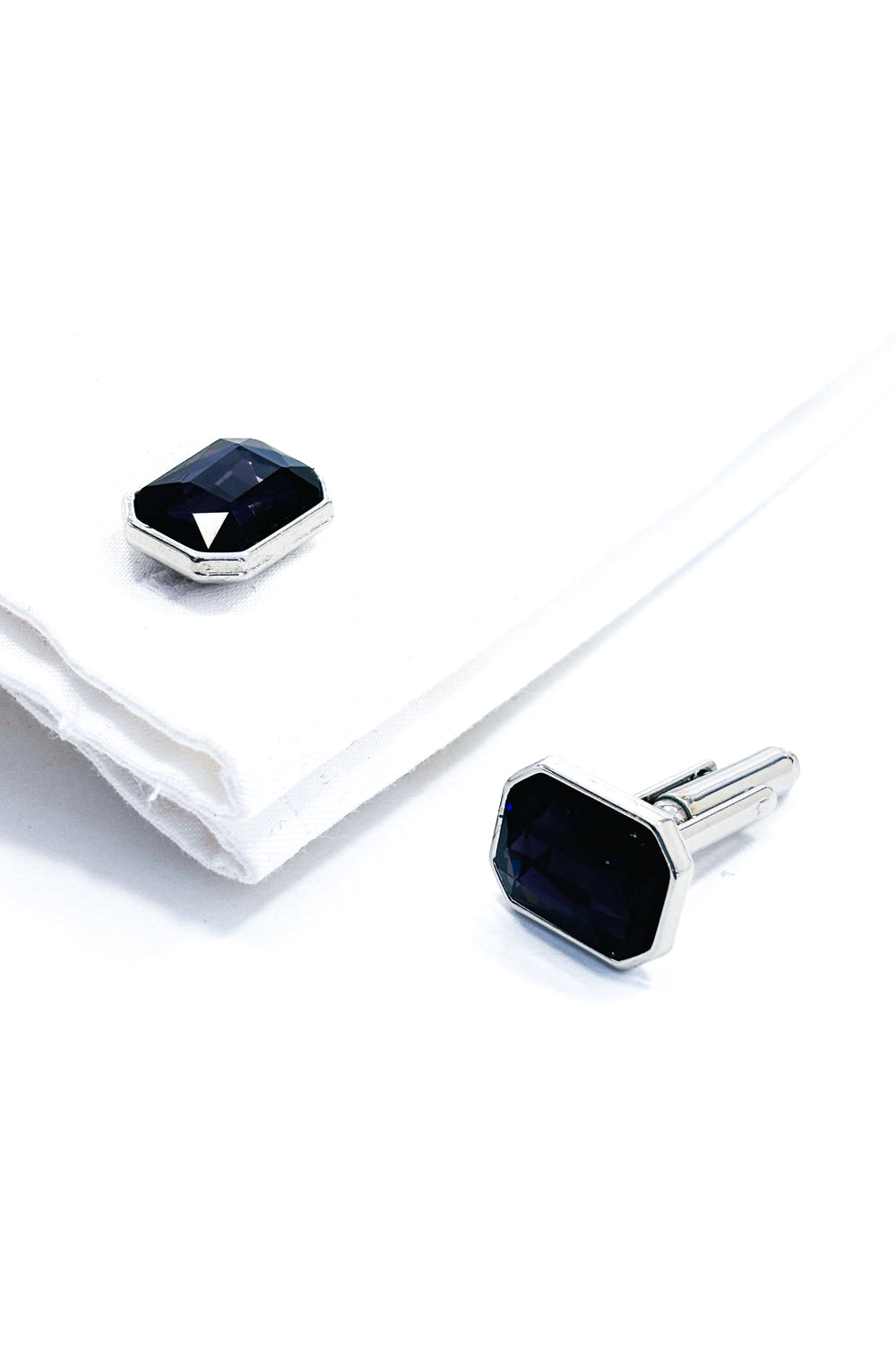 Deep purple emerald cut crystal silver cufflinks.