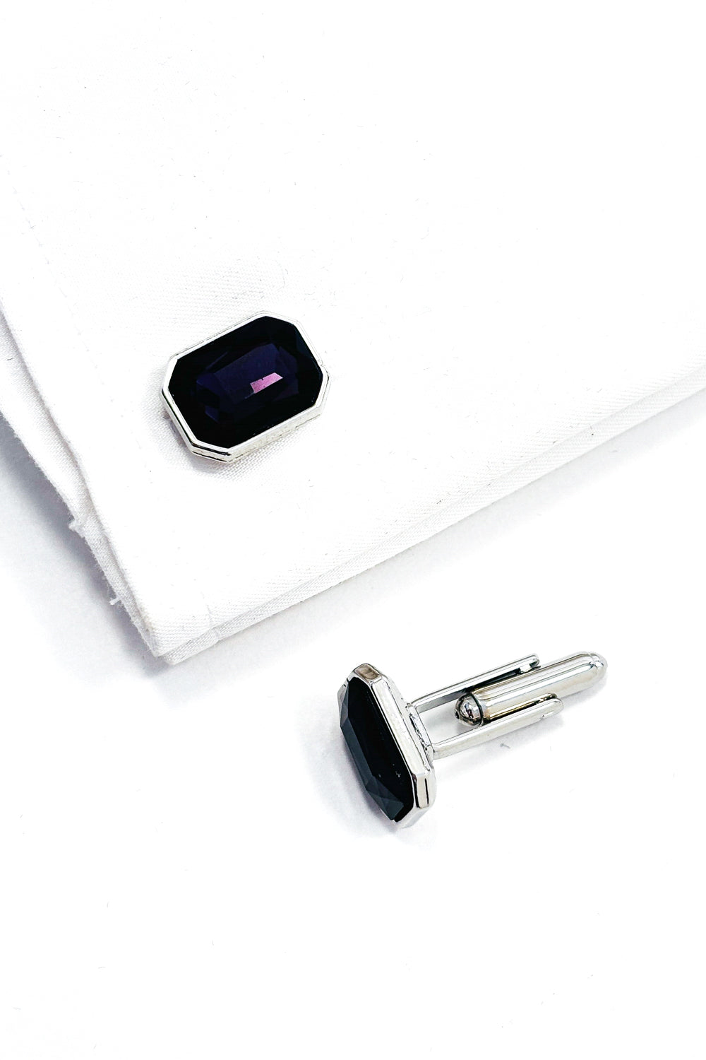Deep purple emerald cut crystal silver cufflinks.