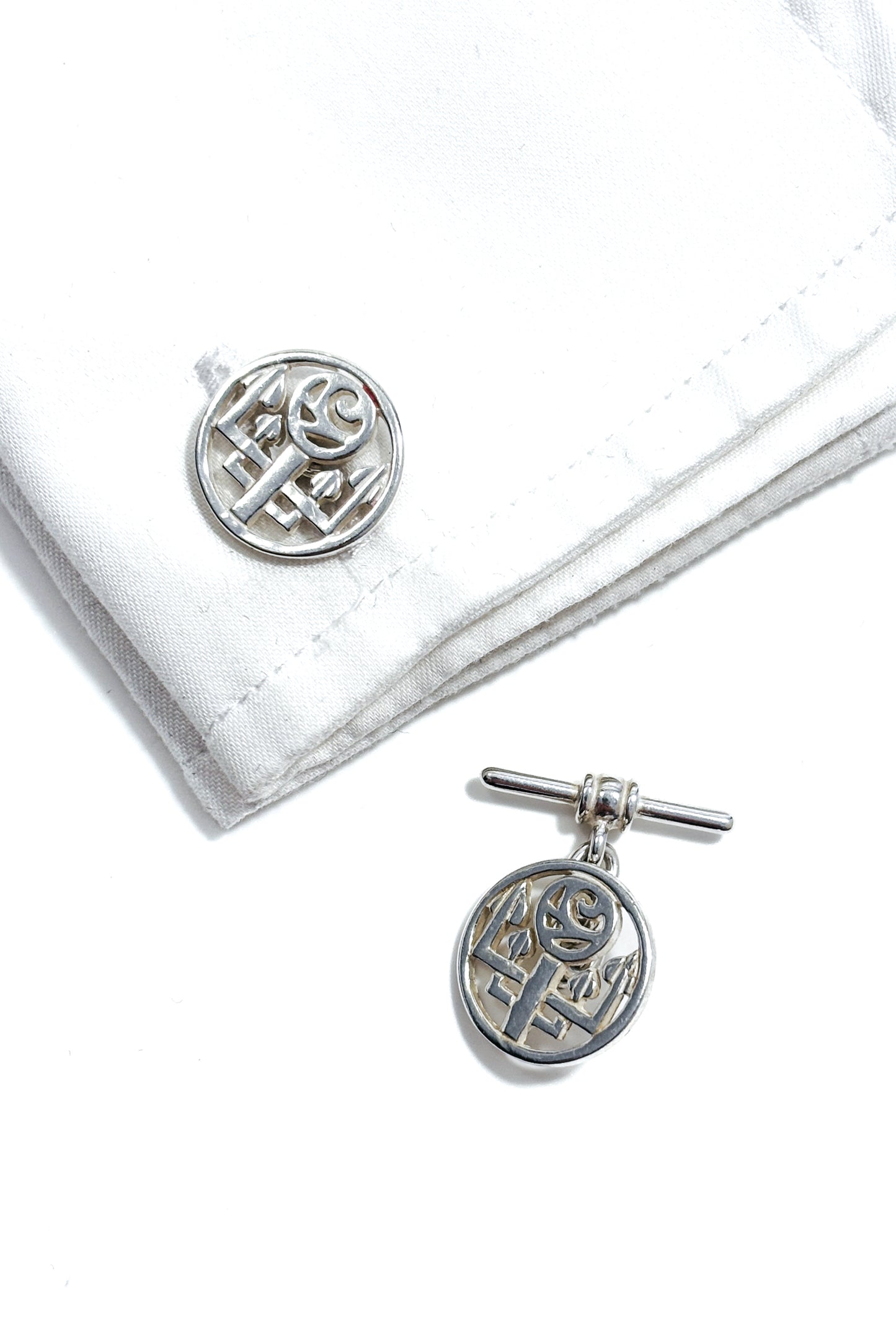 925 silver circular Nouveau style cufflinks.