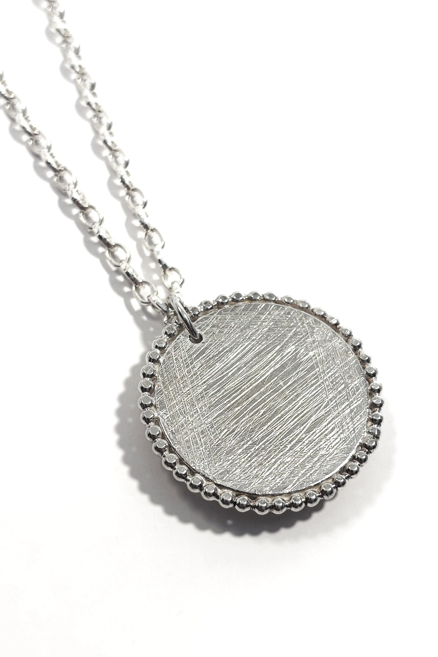 Solar quartz bezel set 925 silver pendant.