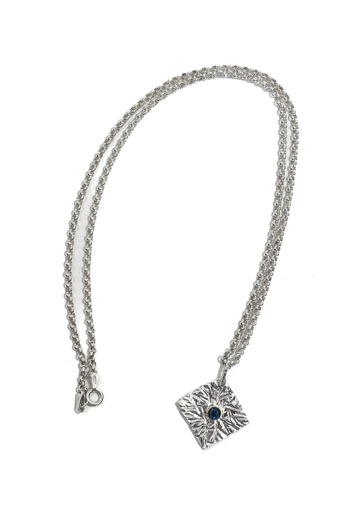 Sapphire bezel set 925 silver pendant.