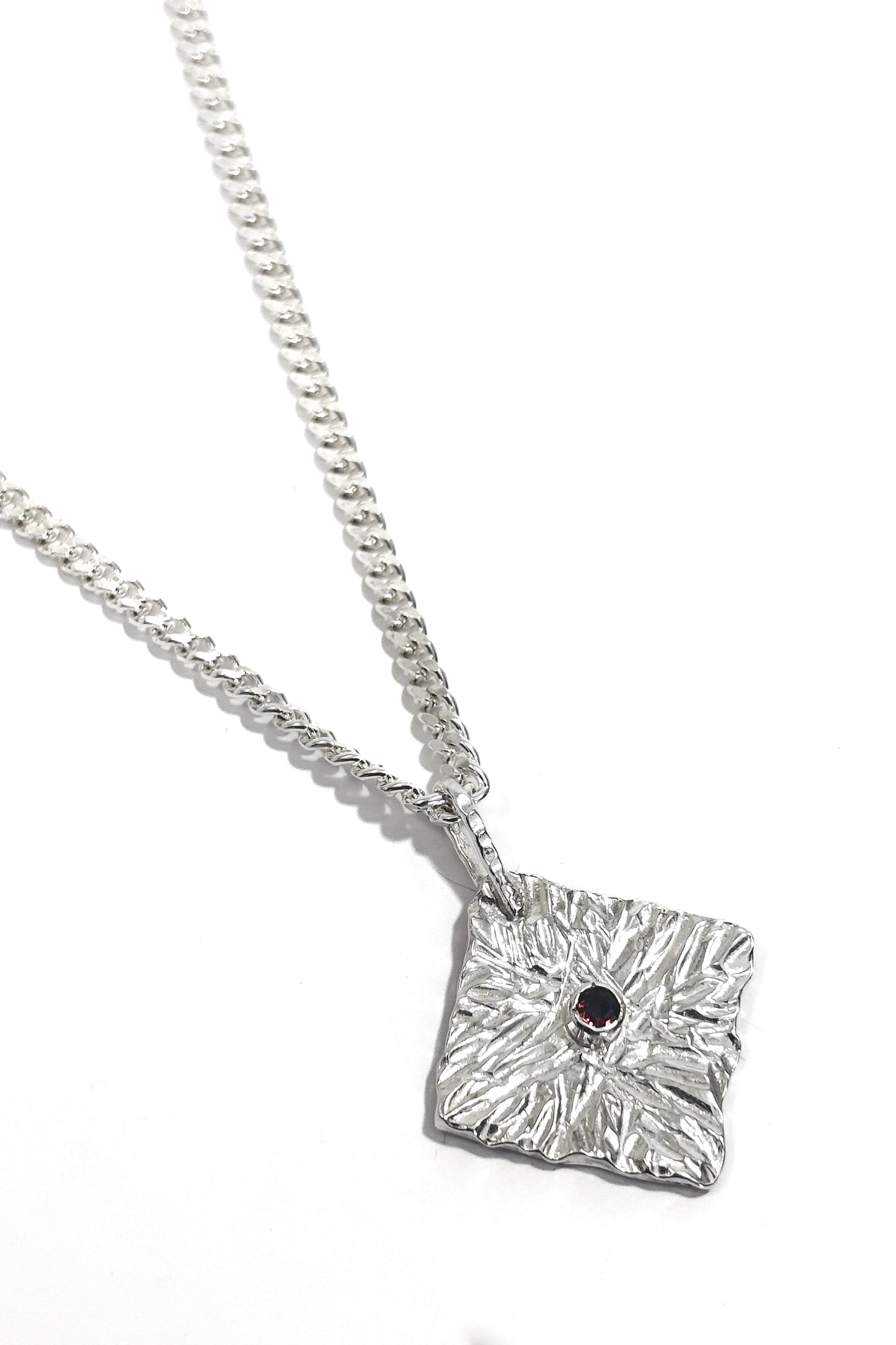 Cognac diamond bezel set 925 pendant.