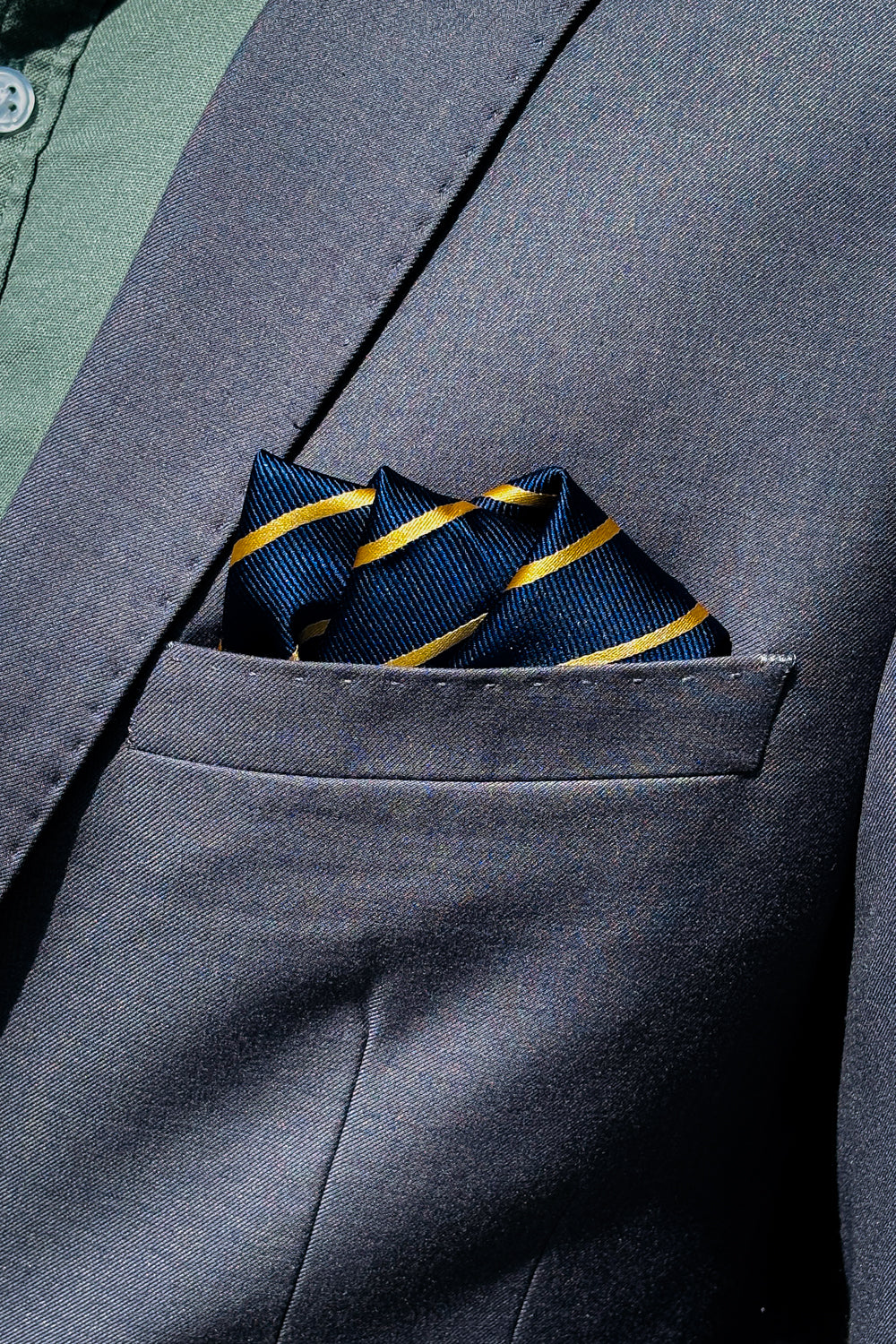 Navy blue & gold striped design pocket square.