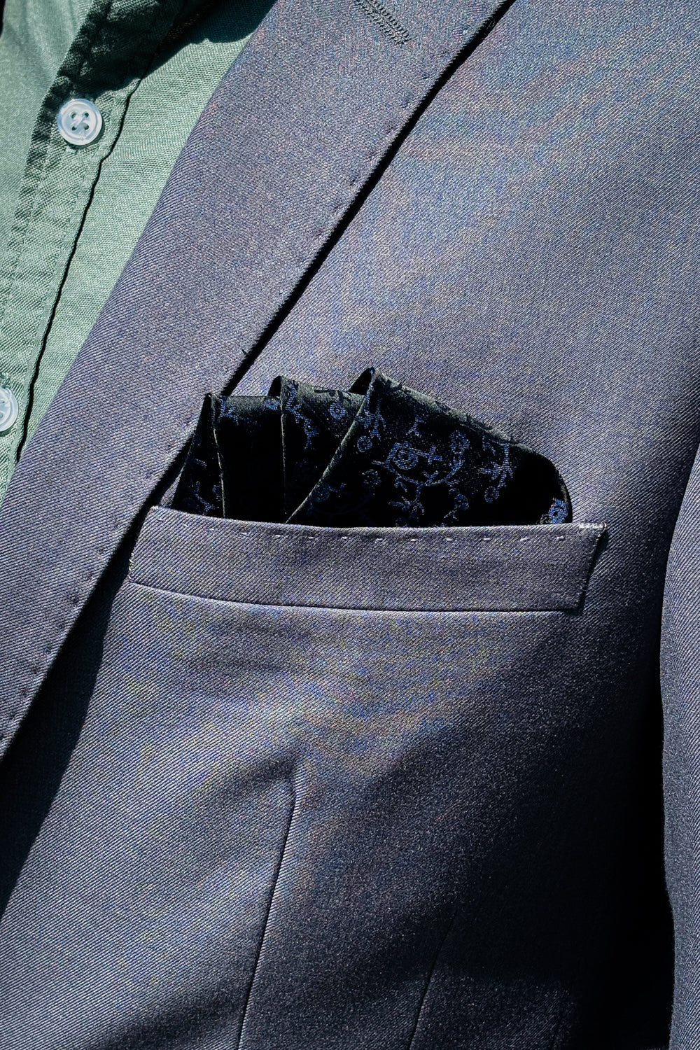Black & blue paisley design pocket square.