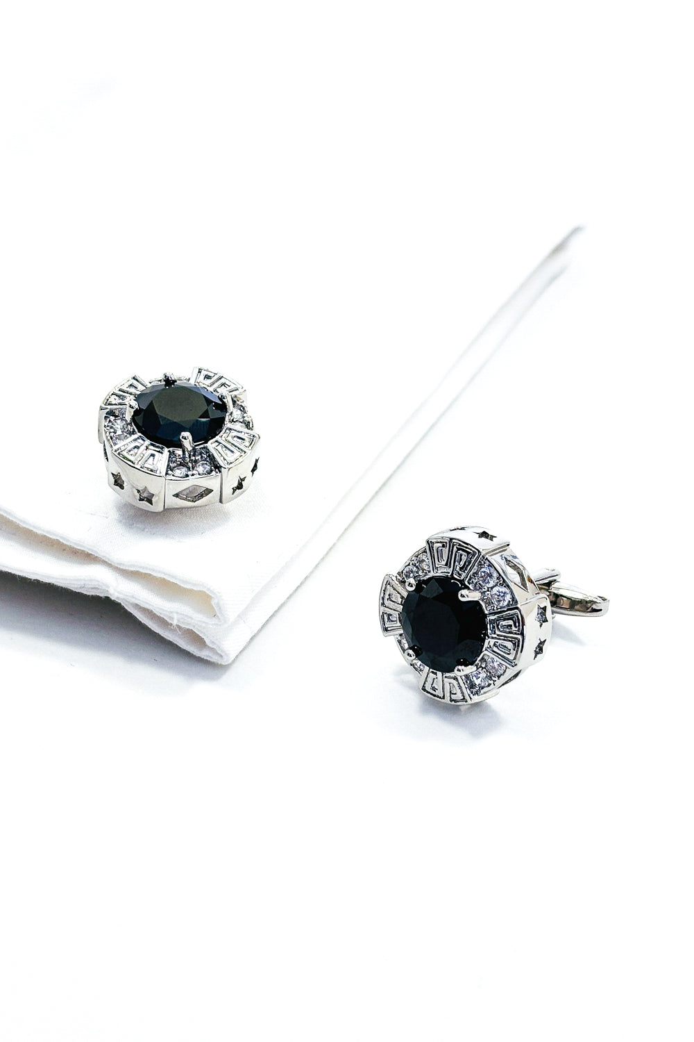 Silver round black crystal cufflinks.
