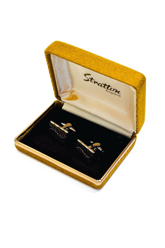 Stainless steel gold plated floral cufflinks.