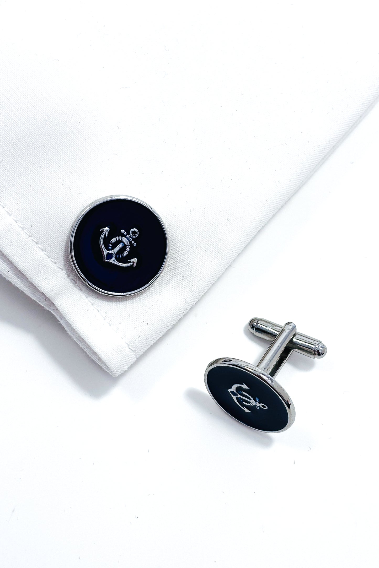 Stainless steel blue anchor cufflinks.