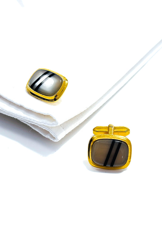 Stainless steel gold plated MOP cufflinks.