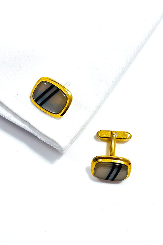 Stainless steel gold plated MOP cufflinks.