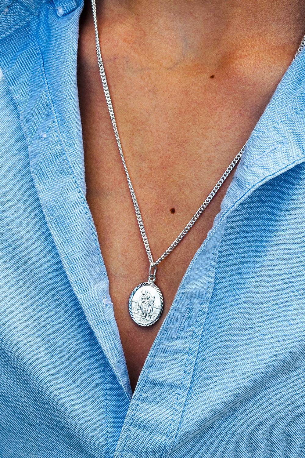 Oval St. Christopher 925 silver pendant.