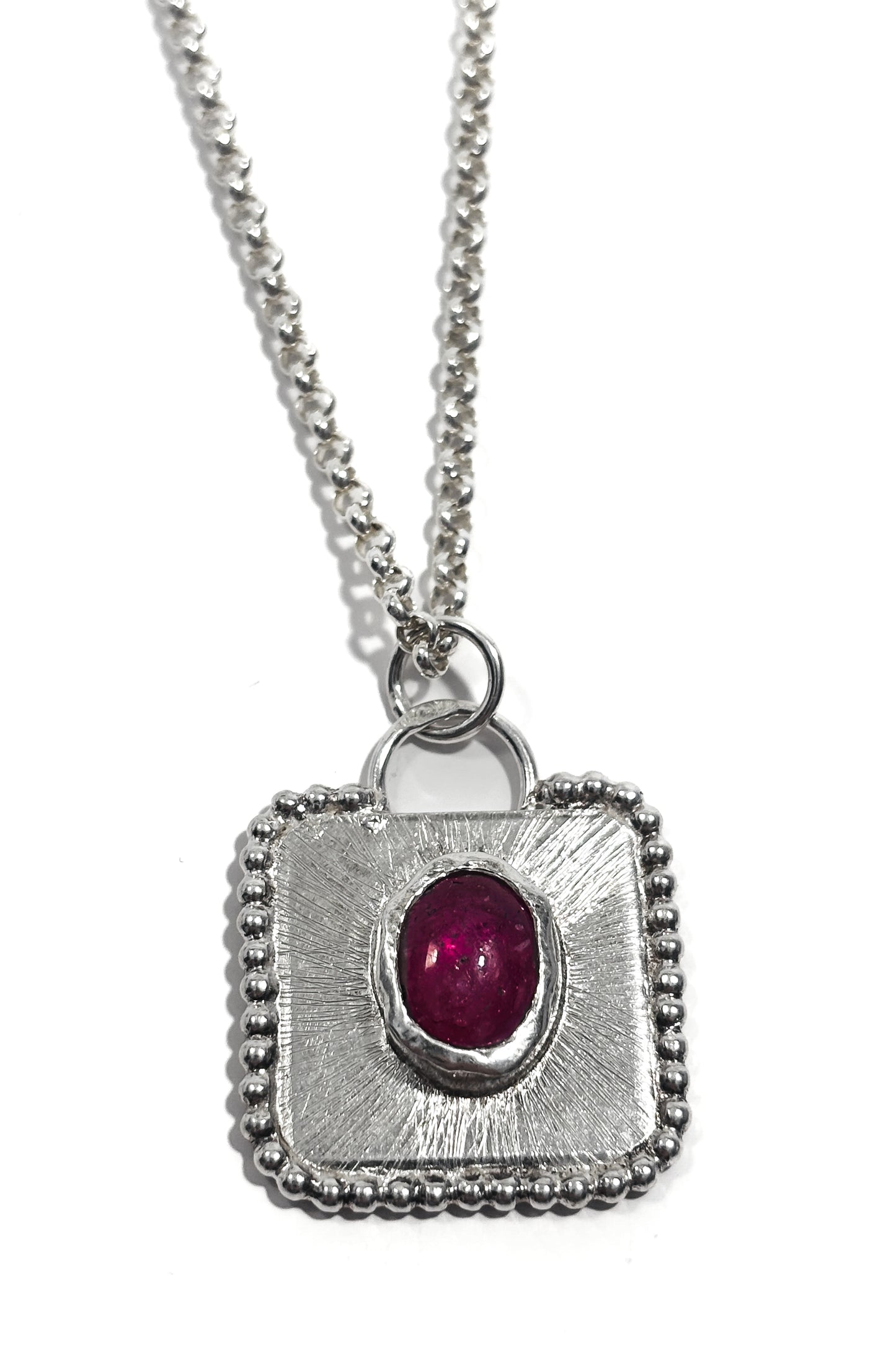 Ruby bezel set 925 silver pendant.