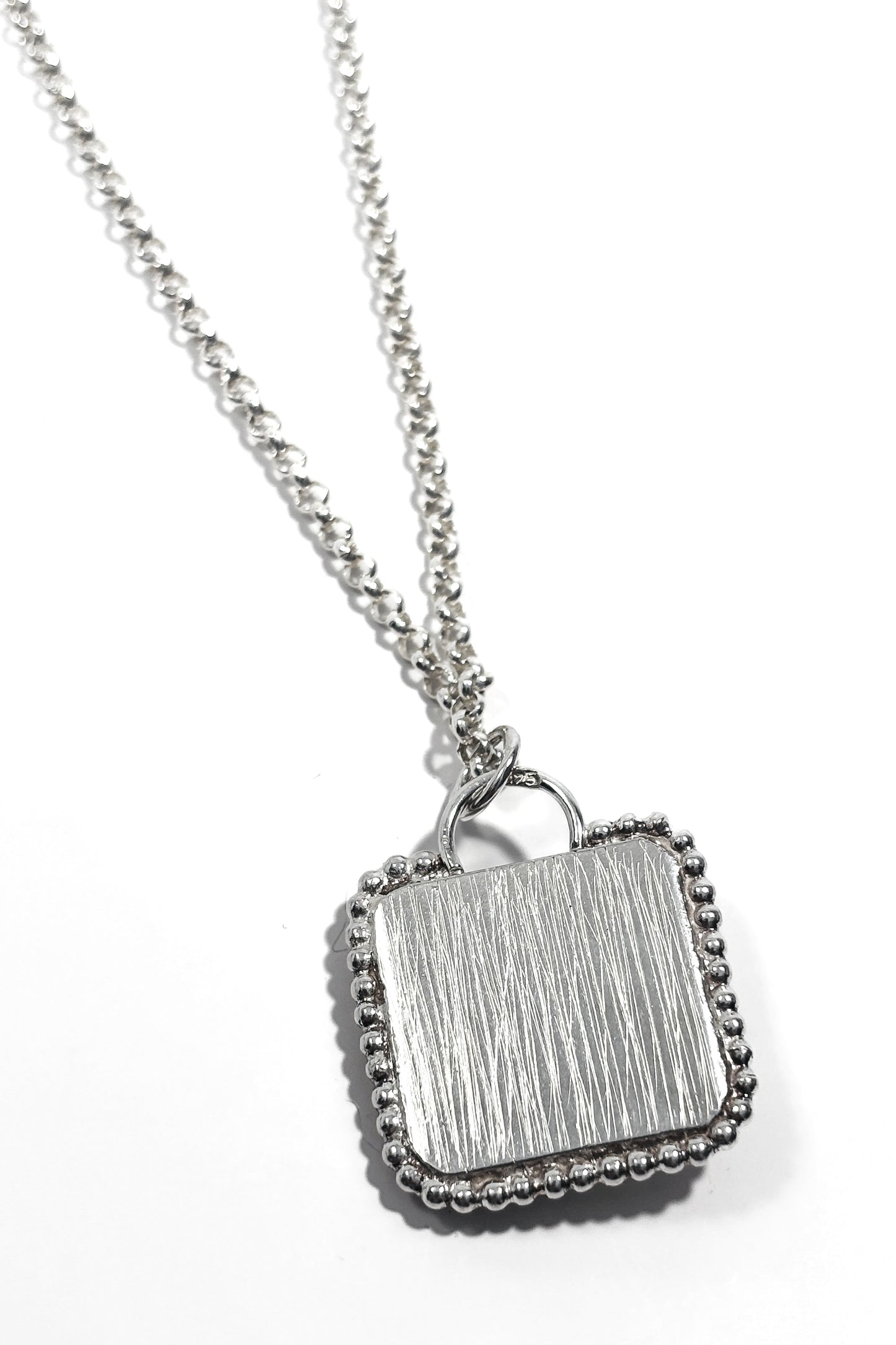 Ruby bezel set 925 silver pendant.