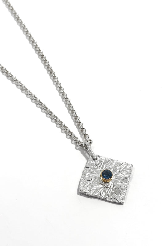 Sapphire bezel set 925 silver pendant.