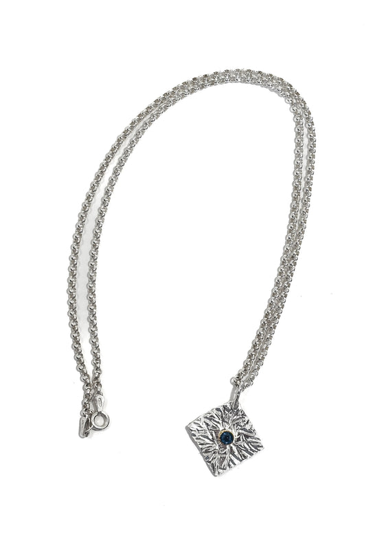 Sapphire bezel set 925 silver pendant.