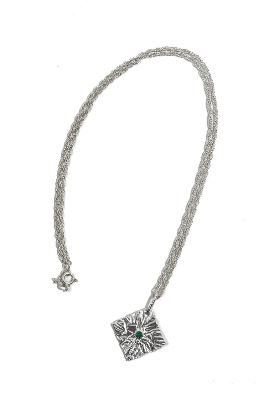 Emerald bezel set 925 silver pendant.