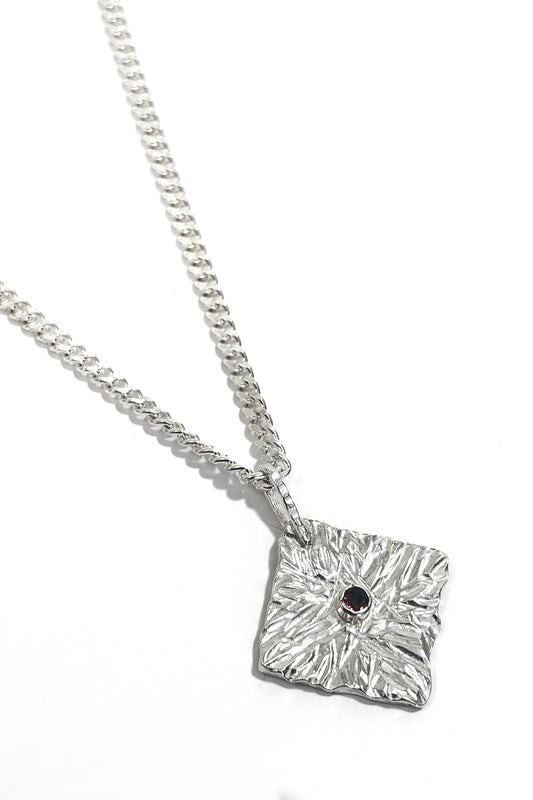 Cognac diamond bezel set 925 pendant.