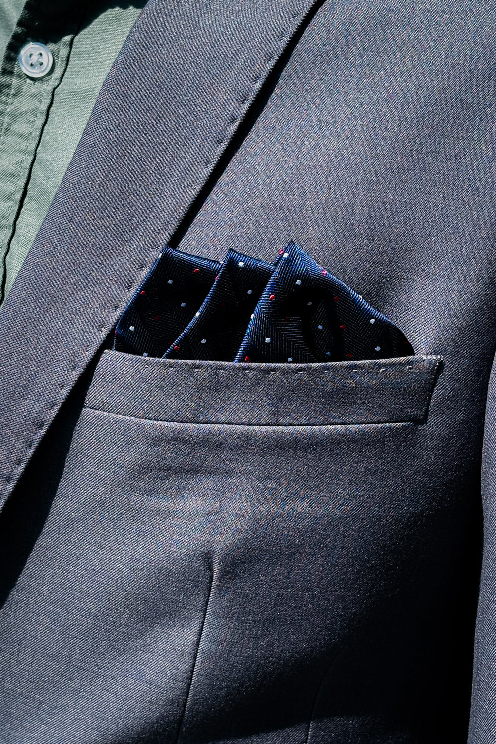 Navy blue, white & red polka dot design pocket square.