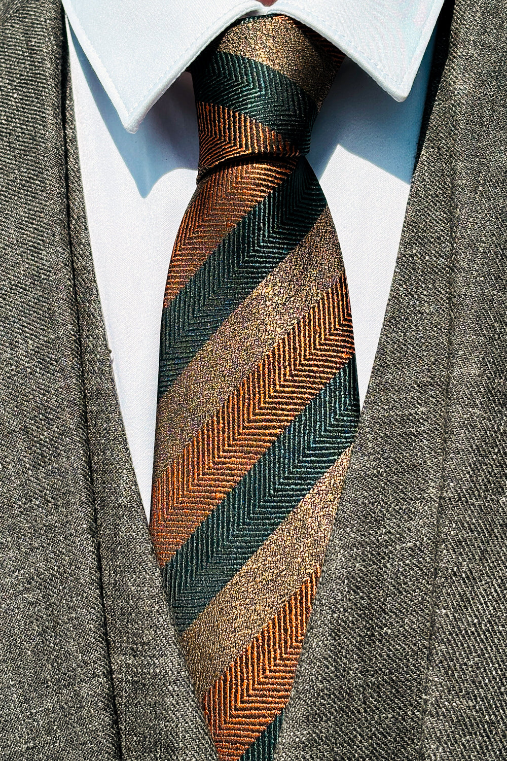 Brown, green & orange striped 8cm tie.