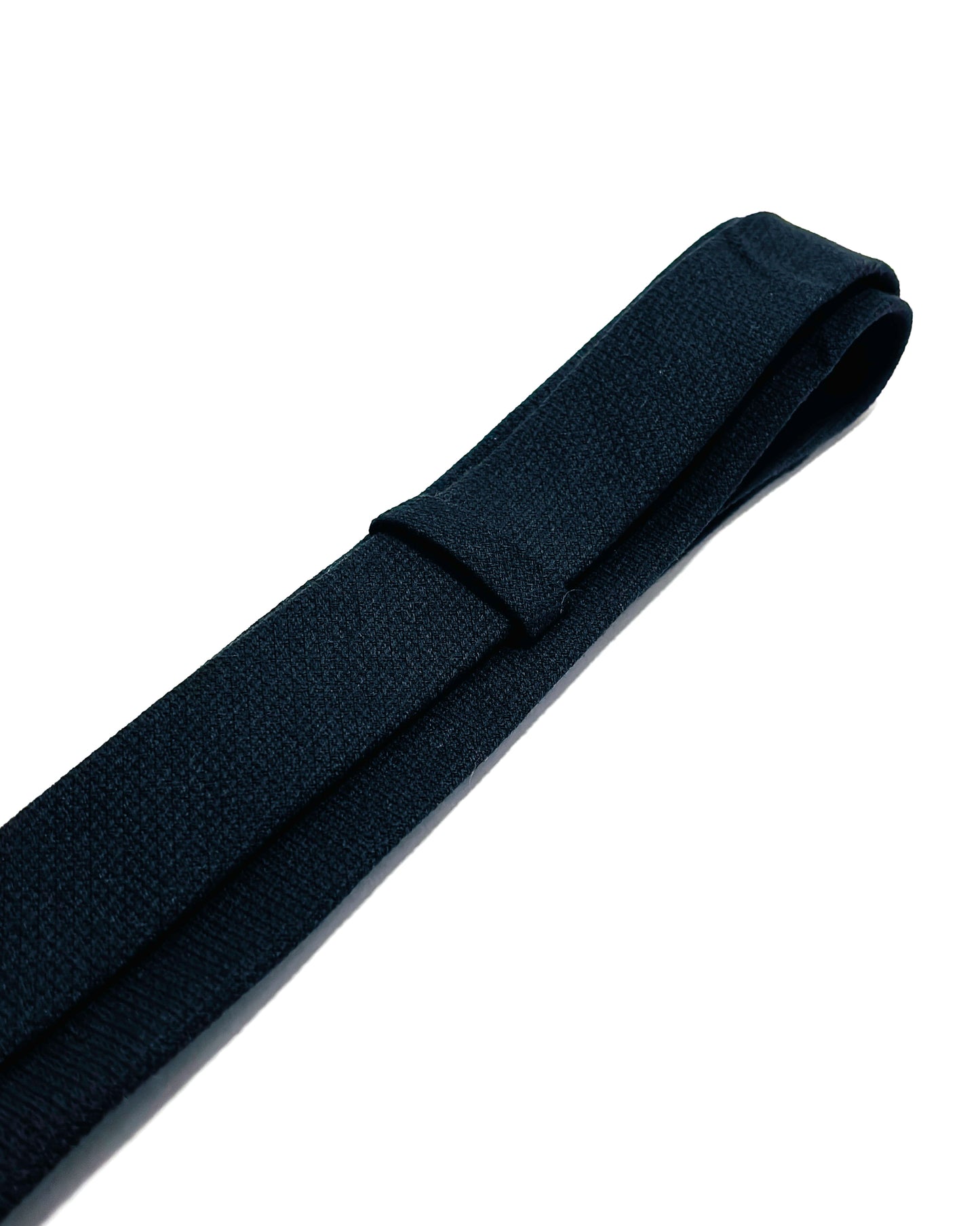 Slim 6cm black textured tie.
