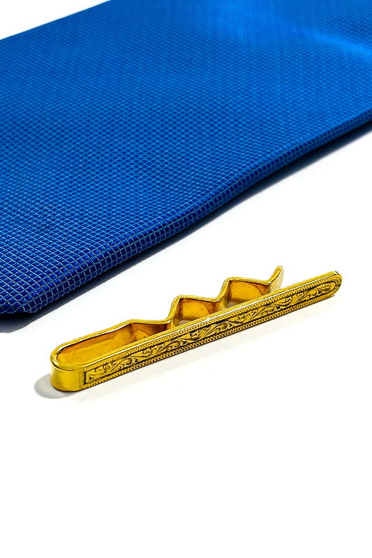 Gold plated 925 silver floral tie clip.